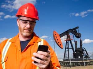 Texting Oil Worker